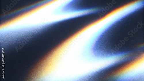 Rainbow iridescent holographic gradient with crystal prism rays, colorful light flare and sparkle, abstract retro film burn overlay for creative designs.