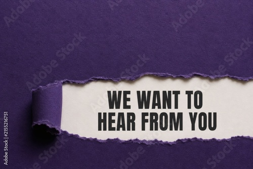 Hear Our Voice: A ripped purple paper reveals a white background with black text WE WANT TO HEAR FROM YOU in bold, inviting engagement.