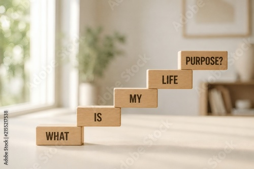 What is my life purpose? Wooden blocks arranged in stairs with text WHAT IS MY LIFE PURPOSE?