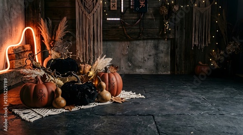 A dimly lit atmospheric interior scene depicts a cozy fireplace with a warm glow surrounded by various decorative elements creating a comforting and inviting