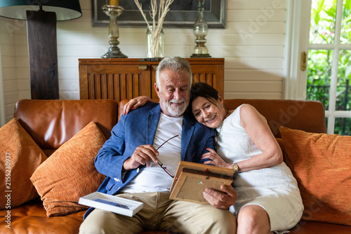 фотографія Elderly couple cherishing memories together