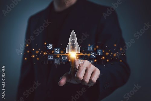 Business growth concept showing a professional launching a glowing rocket, symbolizing startup success, innovation, digital strategy, entrepreneurship, technology, leadership, investment.