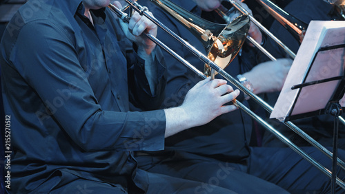 Konstfotografi Closeup of musician playing trombone during symphony orchestra performance