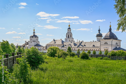 Green garden of the Assumption Monastery in Sviyazhsk on a summer day, Tatarstan Republic of Russia