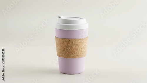Modern reusable coffee cup with cork grip sleeve on neutral background reusable sustainable beverage container
