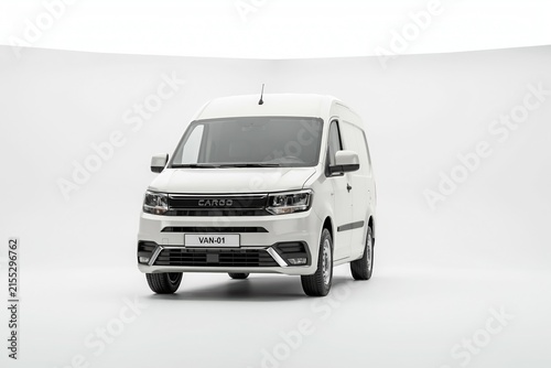White commercial delivery van parked in studio lighting front view with transport delivery commercial automotive