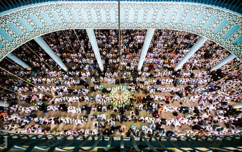 Dhaka, Bangladesh - 20 September 2024: View of a large crowd of worshippers praying inside the Baitul Mukarram National Mosque.