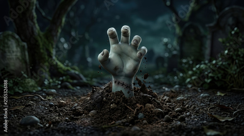 Creepy zombie hand rising from soil in dark eerie forest halloween background creating spooky and chilling atmosphere for night