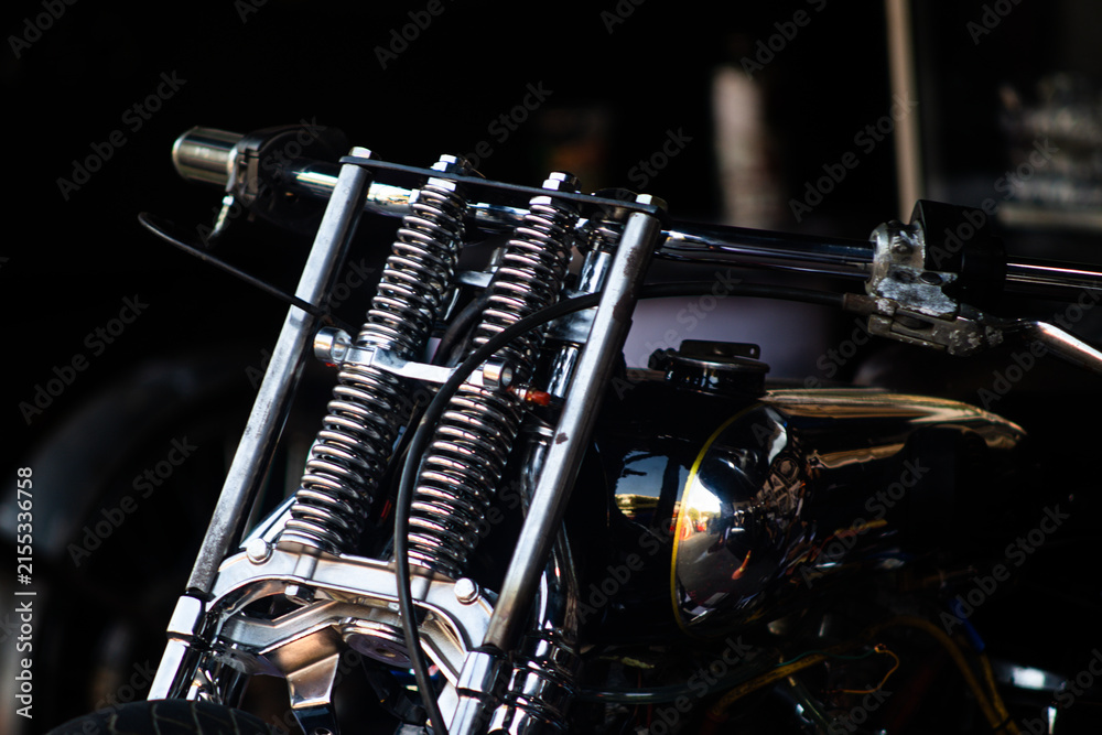 Fototapeta premium Chrome springer fork suspension and handlebar on custom vintage motorcycle