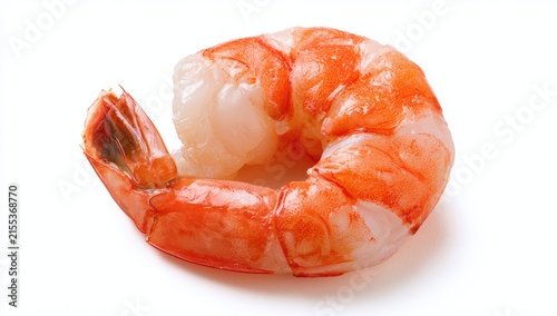 A single cooked shrimp with its tail on, isolated on a white background.