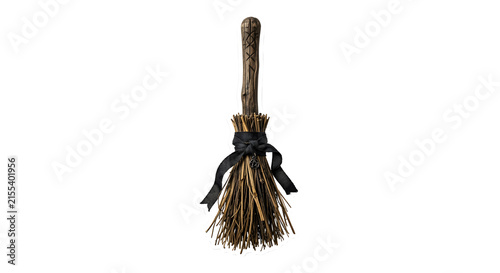 Obraz na płótnie Witch broomstick with runes and black ribbon