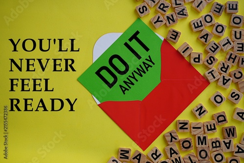 YOU'II NEVER FEEL READY, DO IT ANYWAY. Motivational quotes. Self-inspiration shapes personality. Learning concept. Self-development. Encouraging words. Life-changing guide