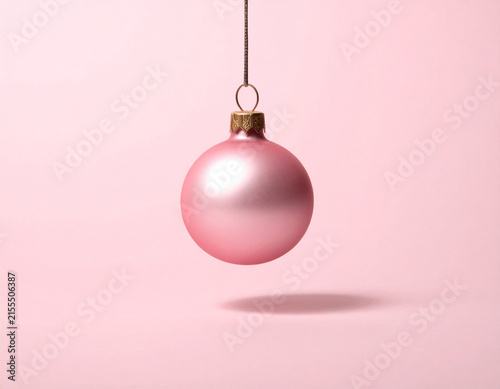 Elegant Pink Christmas Bauble on Pale Pink Background