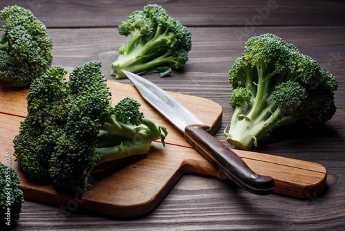 Fresh raw broccoli cook on cutting board
