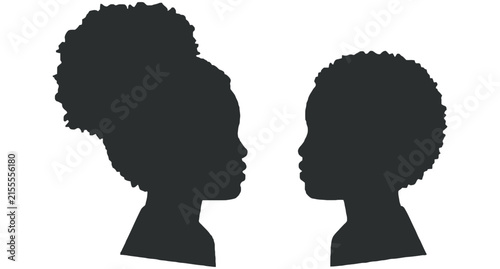 Silhouette profiles of a young african american girl with an afro hairstyle and a boy facing each other on white background