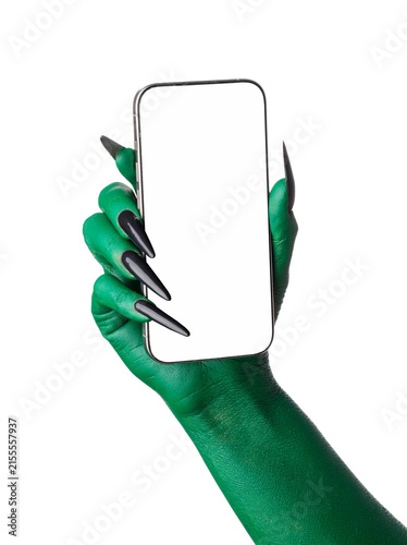 Fotografía Green hand of witch with mobile phone on white background