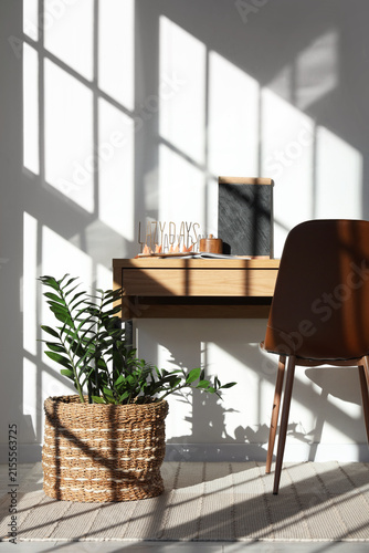 Modern workplace with house...