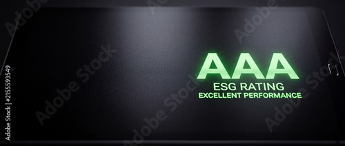 Tablet screen displaying glowing green aaa esg rating text for environmental social and corporate governance performance reporting.