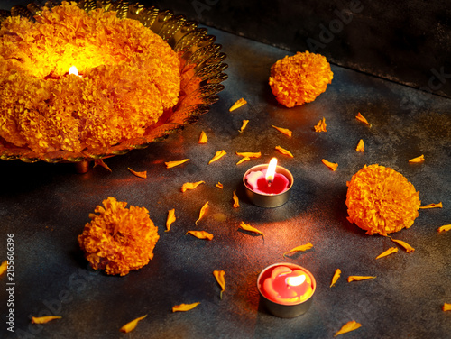 Happy Diwali, Indian festival of lights decorated with marigolds and candles.