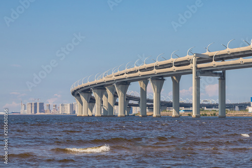 Western high-speed diameter across the Gulf of Finland against the backdrop of a beautiful sky. ZSD road on Kanonersky Island.  St. Petersburg