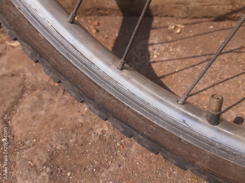 Close Up of Worn Bicycle Tire and Rim