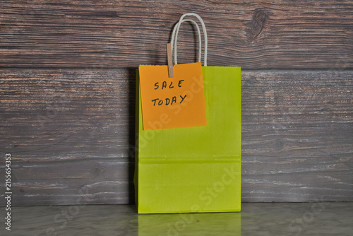Recyclable paper shopping bag with the text 