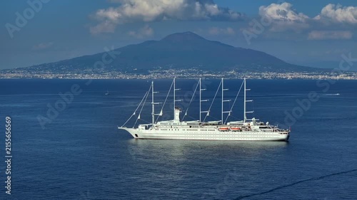 A Hefty five-masted Yacht off the coast of Sorento, Italy. Amalfi Coast Luxury Leisure. Huge Megayacht in Mediterranean.