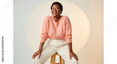 Joyful Curvy Body Positive Model Laughing in Studio Portrait