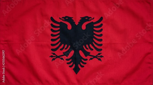 Albania flag with red background and black double‑headed eagle, symbolizing bravery, strength, sovereignty.