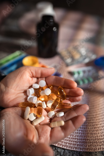 Quadro su tela Taking pills at home for flu, cold, depression, pain relief and general health