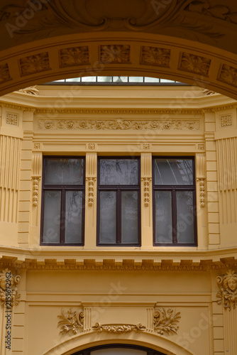 Canvas Print A scenic view of the ornate yellow facade and windows built in 1900 inside the h