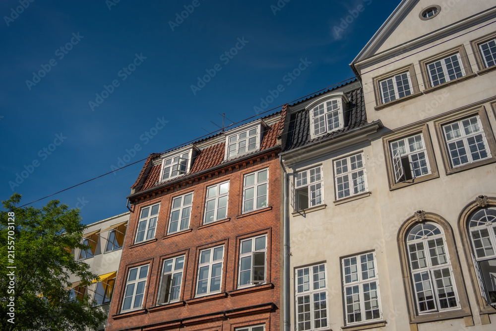 Fototapeta premium Stunning Architectural Facades Under a Clear Blue Sky