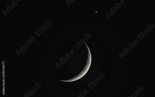 Paris, France - June 17, 2026. A close-up of Venus and the moon at night. 