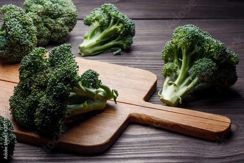 Fresh raw broccoli cook on cutting board