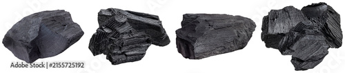 Fotografie Rustic lumps of natural wood charcoal, featuring rough textures and deep dark tones, isolated on transparent background