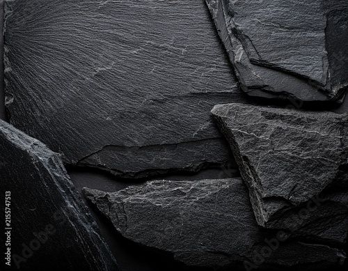 dark grey black slate background or texture