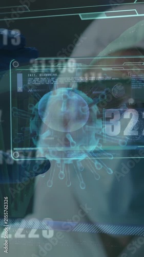 Animation of dna and numbers changing over scientist in ppe suit holding screen with covid 19 cell