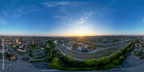 Halle, Vlaams Brabant, Belgium, 27th of April, 2025, Experience a breathtaking sunrise illuminating the city, showcasing vibrant colors and unique urban scenery from above