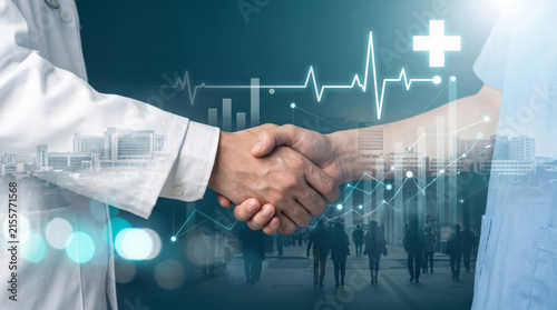 Healthcare professional handshake with a glowing heartbeat chart and hospital skyline overlay, representing global medical partnership.