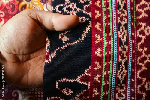 Obraz na płótnie A piece of traditional woven fabric (ikat) that is a hallmark of East Nusa Tenggara (NTT)