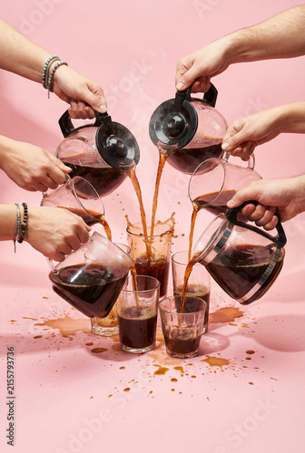 Energetic Coffee Pouring With Splashes And Reflections In Lively Studio Setting