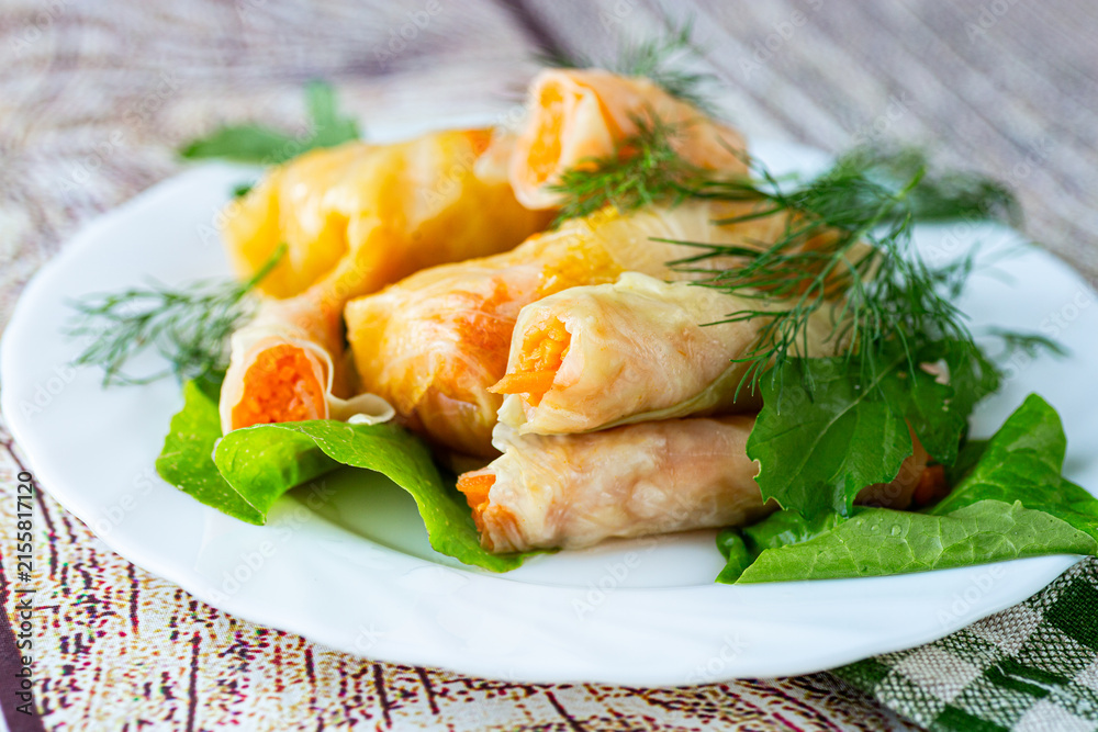 Fototapeta premium Korean pickled cabbage rolls stuffed with fresh carrot filling