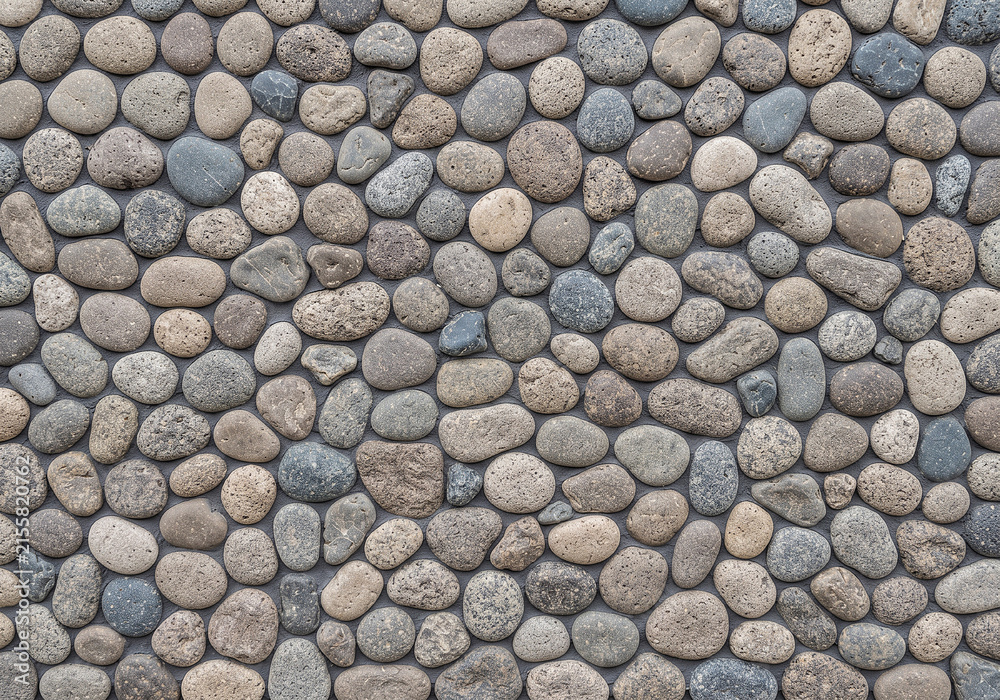 Seamless gray pebble stone wall texture vector for backgrounds and architectural designs