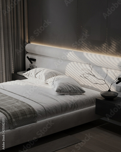 Foto Elegant contemporary bedroom with a soft upholstered headboard, white bedding, dark curtains and warm ambient lighting in a refined minimalist interior