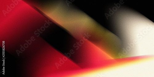 Abstract grainy background with blurred red and yellow light leaks on a dark textured surface.