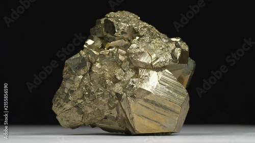 Pyrite - mineral, shiny iron sulfide in natural crystal form, also known as fools gold