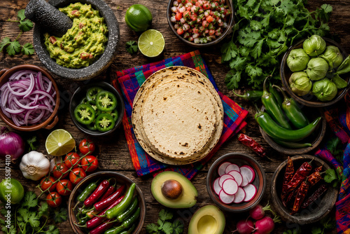 Traditional Mexican Cooking Ingredients Top View Concept with Tortillas and Guacamole