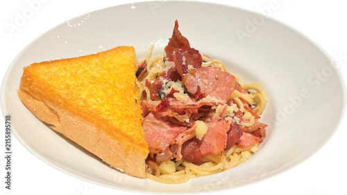 Canvastavla A delicious plate of spaghetti carbonara served with a golden toasted slice of bread, ready to be savored