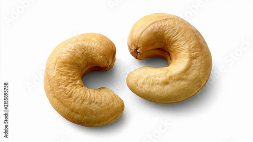 Two raw cashew nuts isolated on white background