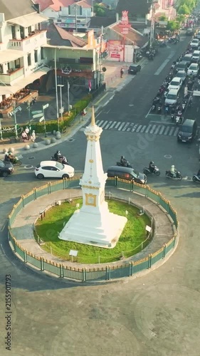 Close aerial view of iconic white Tugu Yogyakarta monument